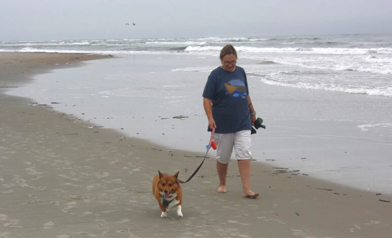 Woman with corgi reduced 1-onlypawleys