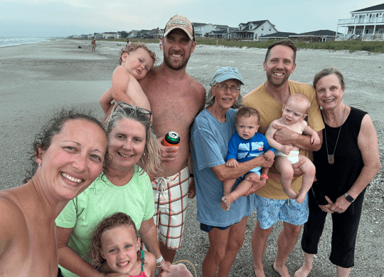 Tuttle family on beach reduced-onlypawleys